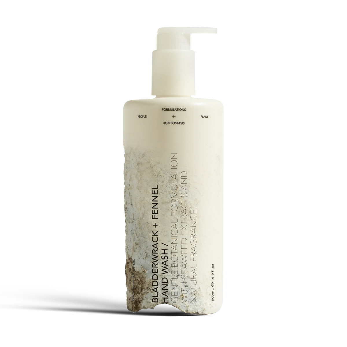 dulcie Bladderwrack and Fennel hand wash in a cream bottle with a textured, stone-like base and pump dispenser.