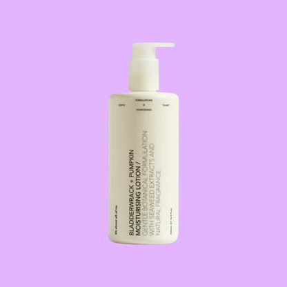 dulcie Bladderwrack and Pumpkin Moisturising Lotion in a minimalist white pump bottle with botanical ingredients, shown from a different angle.