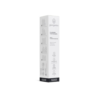 georganics activated charcoal toothpaste tube with hydroxyapatite and fluoride in white recyclable aluminum packaging