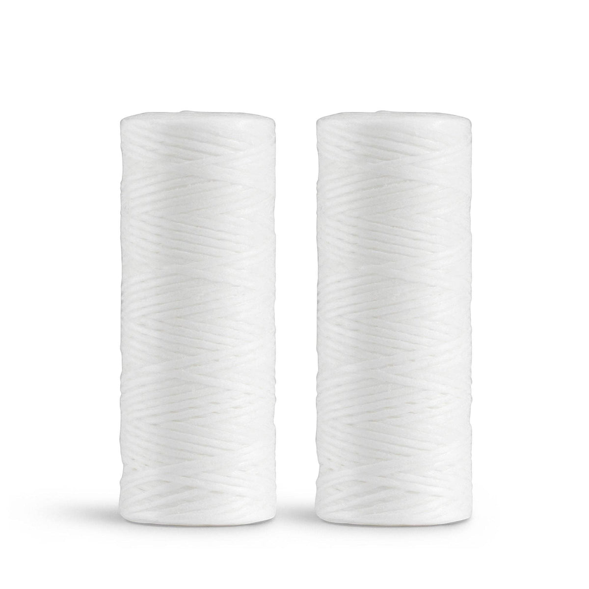 Two white georganics dental floss refill rolls made from bio-nylon with a smooth candelilla wax coating
