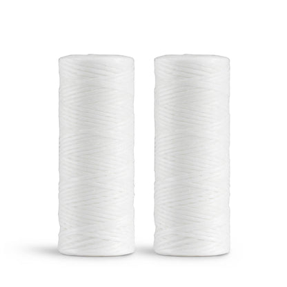 Two white georganics dental floss refill rolls made from bio-nylon with a smooth candelilla wax coating