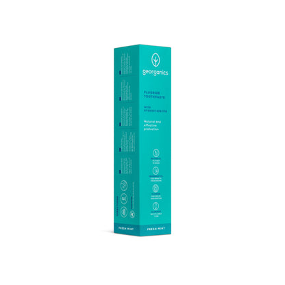 georganics Fresh Mint toothpaste box with hydroxyapatite and fluoride in a teal recyclable aluminium tube packaging