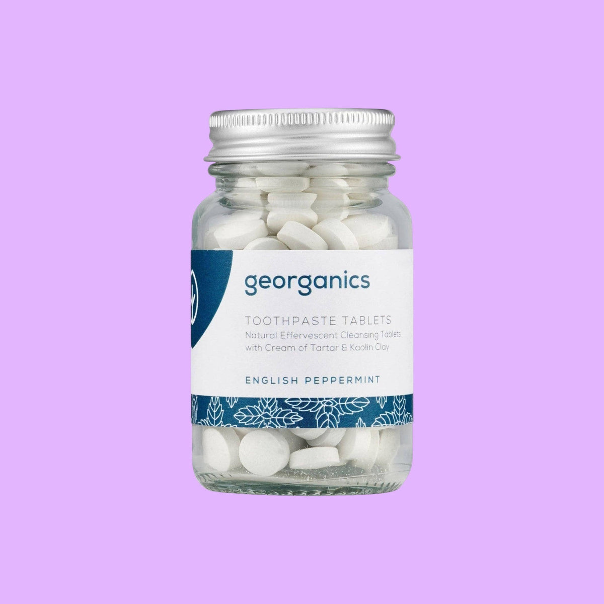 georganics Mineral Toothtablets in a refillable glass jar with an aluminium lid, featuring natural peppermint flavour.