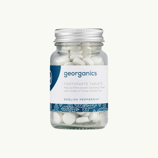 georganics Mineral Toothtablets in a refillable glass jar with an aluminium lid and peppermint flavour label