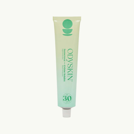 odyskin SPF 30 mineral sunscreen in a green gradient tube with zinc oxide for daily sun protection