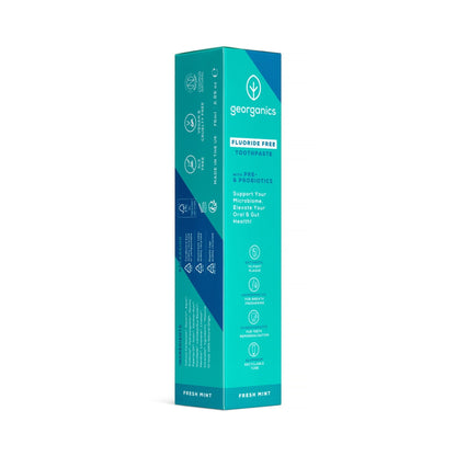 Georganics fluoride-free peppermint prebiotic and probiotic toothpaste in a recyclable teal aluminium tube.