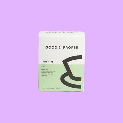 Good and Proper Tea Jade Tips green tea box featuring minimalist white and pale green packaging with almond sweetness notes.
