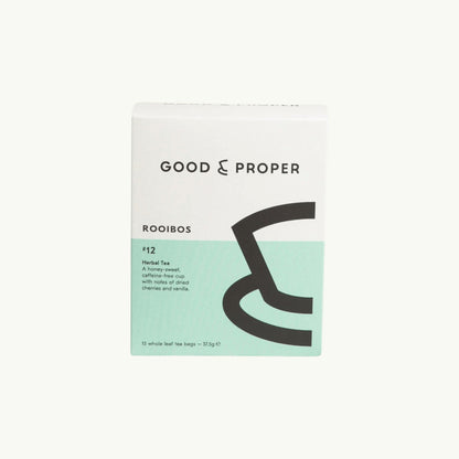Good and Proper Tea Rooibos tea bags in a white and mint green recyclable cardboard box with honey and vanilla flavour notes.