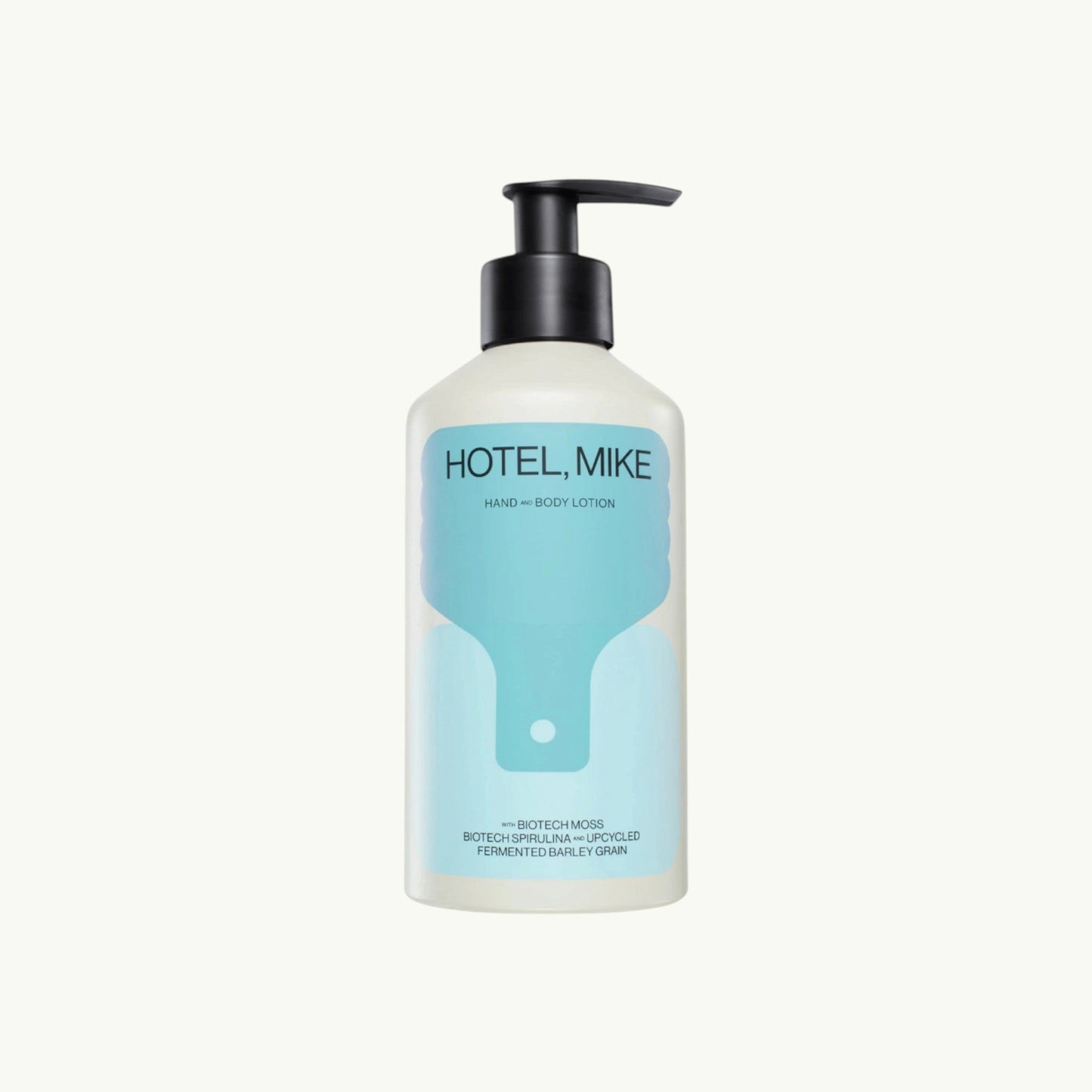 Hotel, Mike hand and body lotion in a sustainable aluminium bottle with a black pump dispenser.
