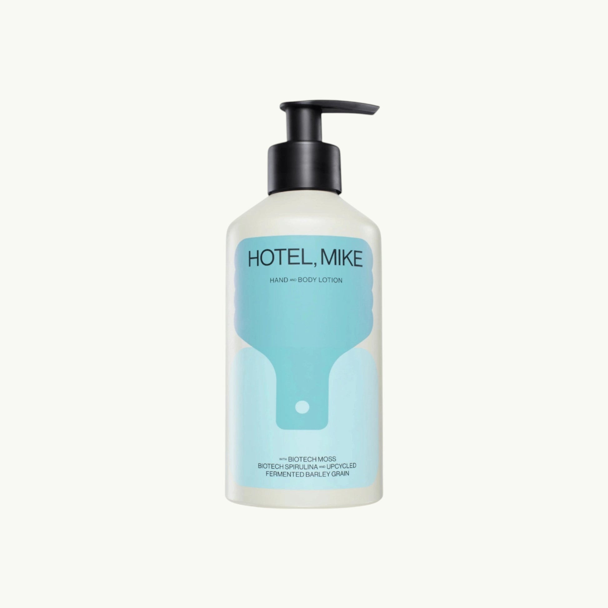 Hotel, Mike hand and body lotion in a sustainable aluminium bottle with a black pump dispenser.