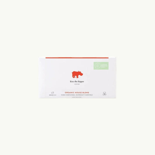 Kiss the Hippo organic house blend coffee pods in a white box with a red hippo logo on a light background.