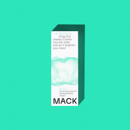 MACK Not Guilty toilet descaler box with citrus scent, vegan and biodegradable cleaning product on green background