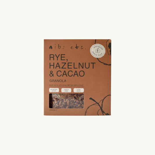 BRiMM Nibs Etc. Rye, Hazelnut & Cacao Granola in a sustainable brown box with a clear window showing the product.