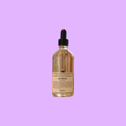 Norfolk Natural Living Loo Parfum Eau Du Soleil essential oil bathroom fragrance in a 100ml glass dropper bottle.