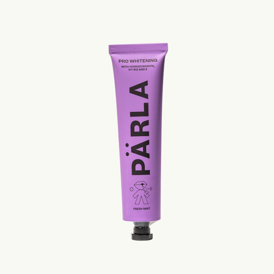 Pärla Parla pro whitening toothpaste in a purple 75ml tube with hydroxyapatite, vitamin B12, and vitamin E.