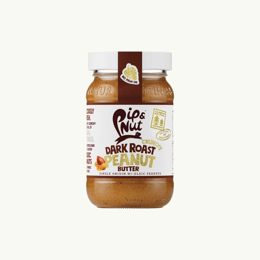 BRiMM Pip & Nut dark roast crunchy peanut butter in a glass jar with a white lid and no palm oil label