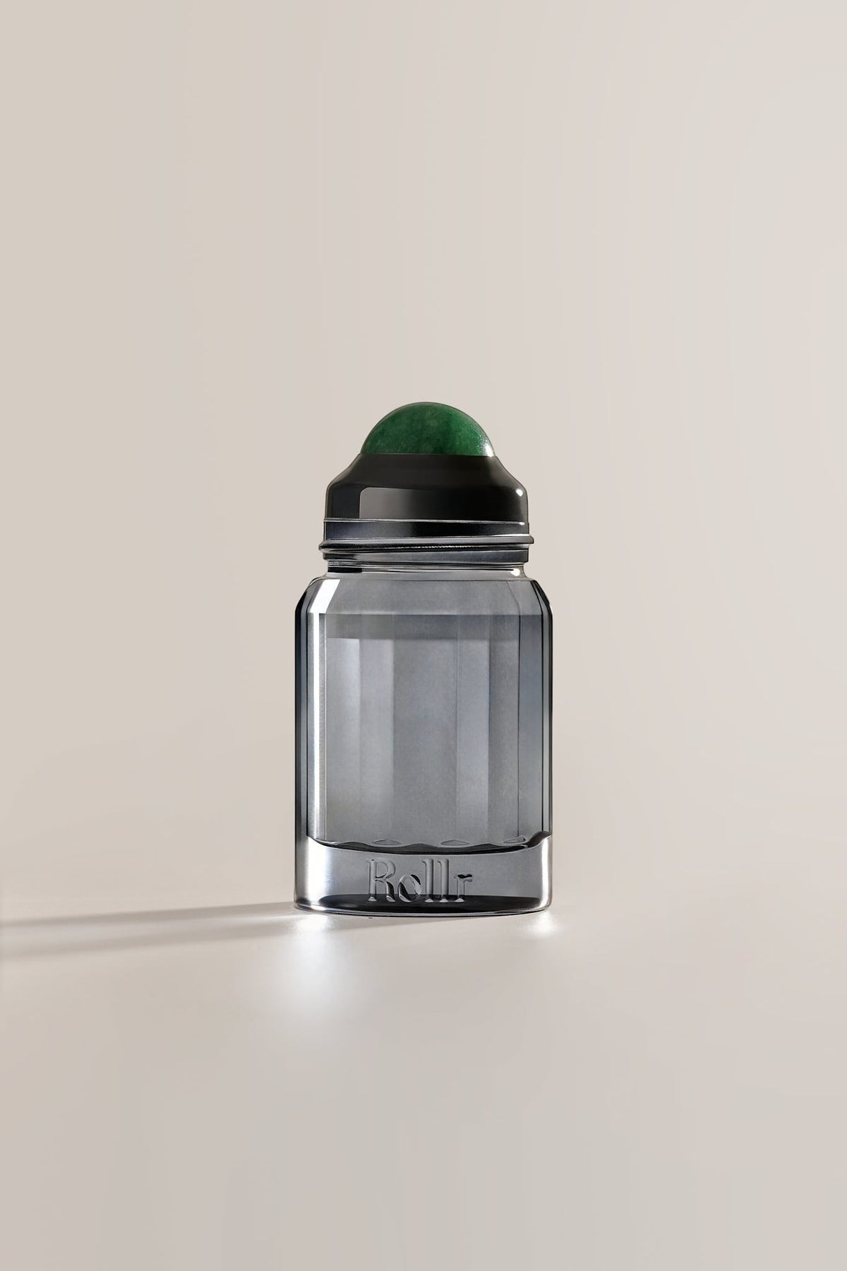 Rollr refillable glass roll-on deodorant bottle featuring a green aventurine stone roller ball