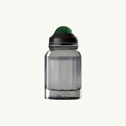Rollr refillable glass deodorant bottle with a green aventurine roller ball for a natural application