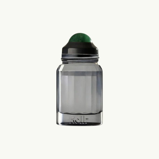 Rollr refillable glass deodorant bottle with a green aventurine roller ball for a natural application