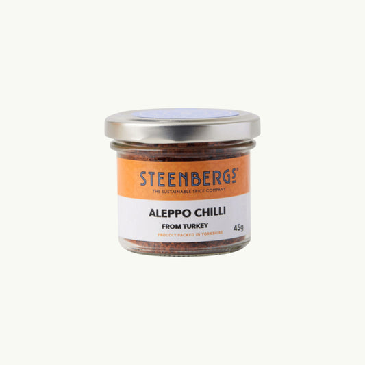 BRiMM Steenbergs organic Aleppo chilli flakes in a recyclable glass jar, a mild Turkish spice for Mediterranean dishes.