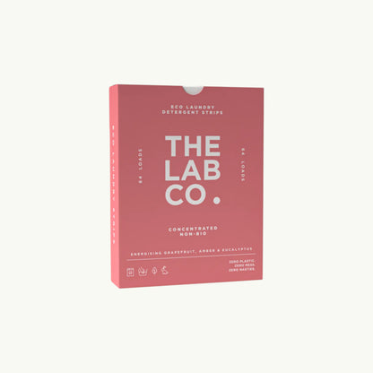 The Lab Co. Energising Laundry Detergent Strips in a pink plastic-free box for 64 loads of eco-friendly laundry.