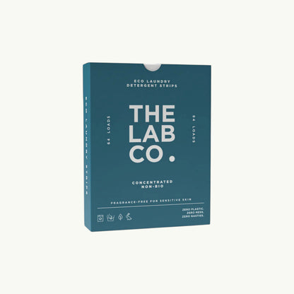 The Lab Co. fragrance-free laundry detergent strips in a teal plastic-free box for 64 loads.