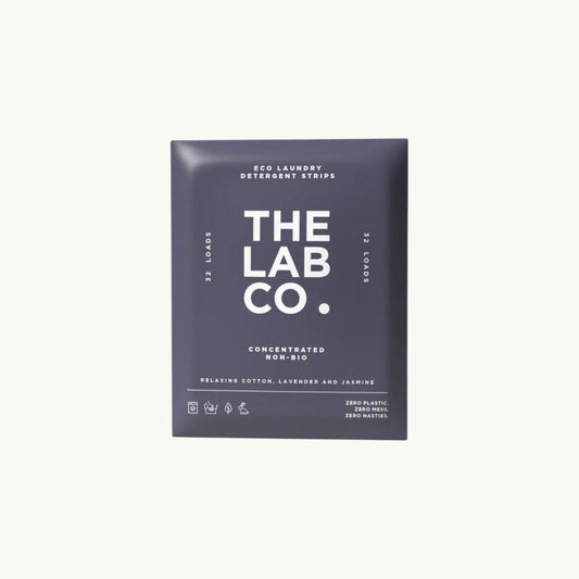 The Lab Co. Relaxing Laundry Detergent Strips in dark purple plastic-free packaging for 32 loads
