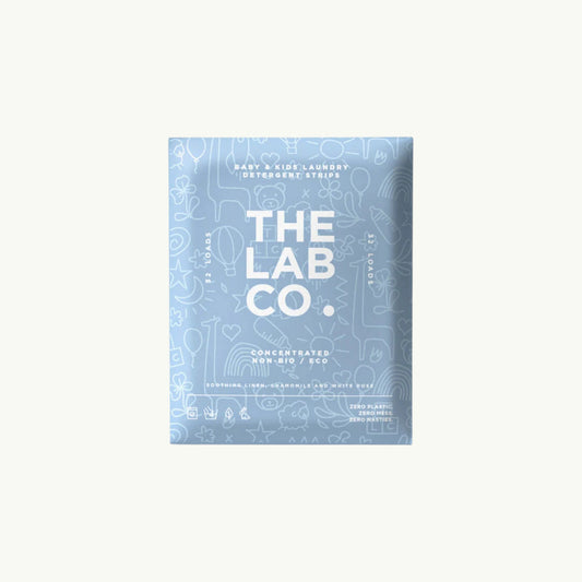 BRiMM The Lab Co. soothing laundry detergent strips in light blue packaging with playful white line art illustrations.