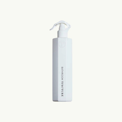 Tincture London antimicrobial white octagonal bathroom spray bottle with safety lock trigger
