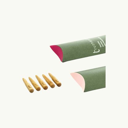 Truthbrush bamboo interdental brushes with five wooden handles and green packaging boxes