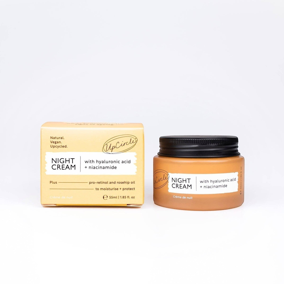 upcircle anti-ageing night cream in a 55ml amber glass jar with matching yellow cardboard packaging box.