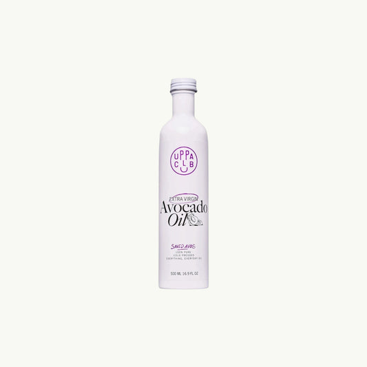 uppaclub extra virgin avocado oil in a white 500ml bottle with minimalist branding and cold-pressed label details.
