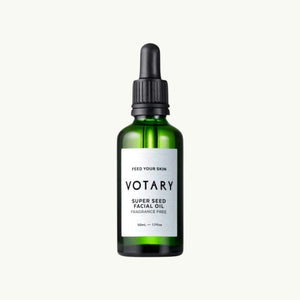 Votary Super Seed Facial Oil in a green glass bottle with a black dropper pump for sensitive skin care.