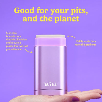 Wild refillable deodorant in a purple anodised aluminium case held in a hand against a purple background.