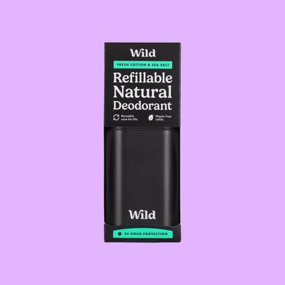 Wild refillable natural deodorant in a matte black aluminium case with Fresh Cotton and Sea Salt packaging (view 2).