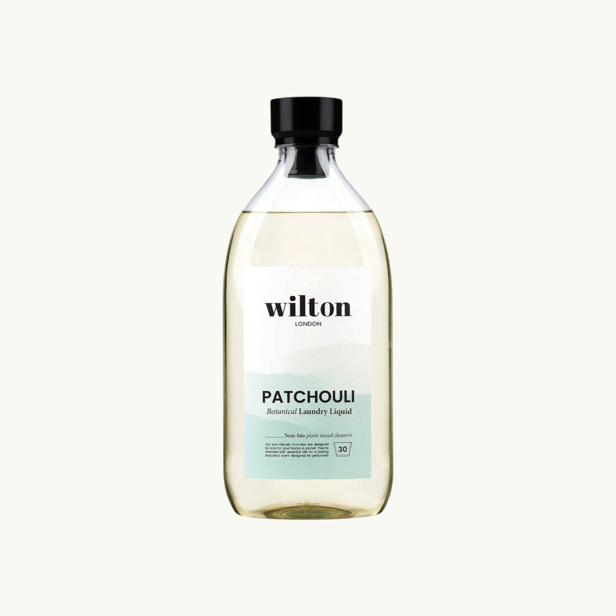 Wilton London Patchouli non-bio laundry liquid in a clear 1.05L bottle with a black cap on a light background.