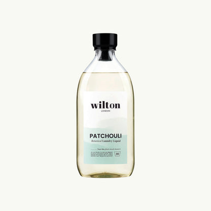 Wilton London Patchouli non-bio laundry liquid in a clear 1.05L bottle with a black cap on a light background.