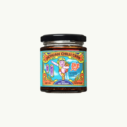 Yep Kitchen Sichuan Chilli Crisp oil in a glass jar with a colourful illustrated label featuring a cartoon character.